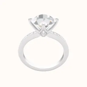 Micropave Engagement Ring With Petal Compass Prong Head